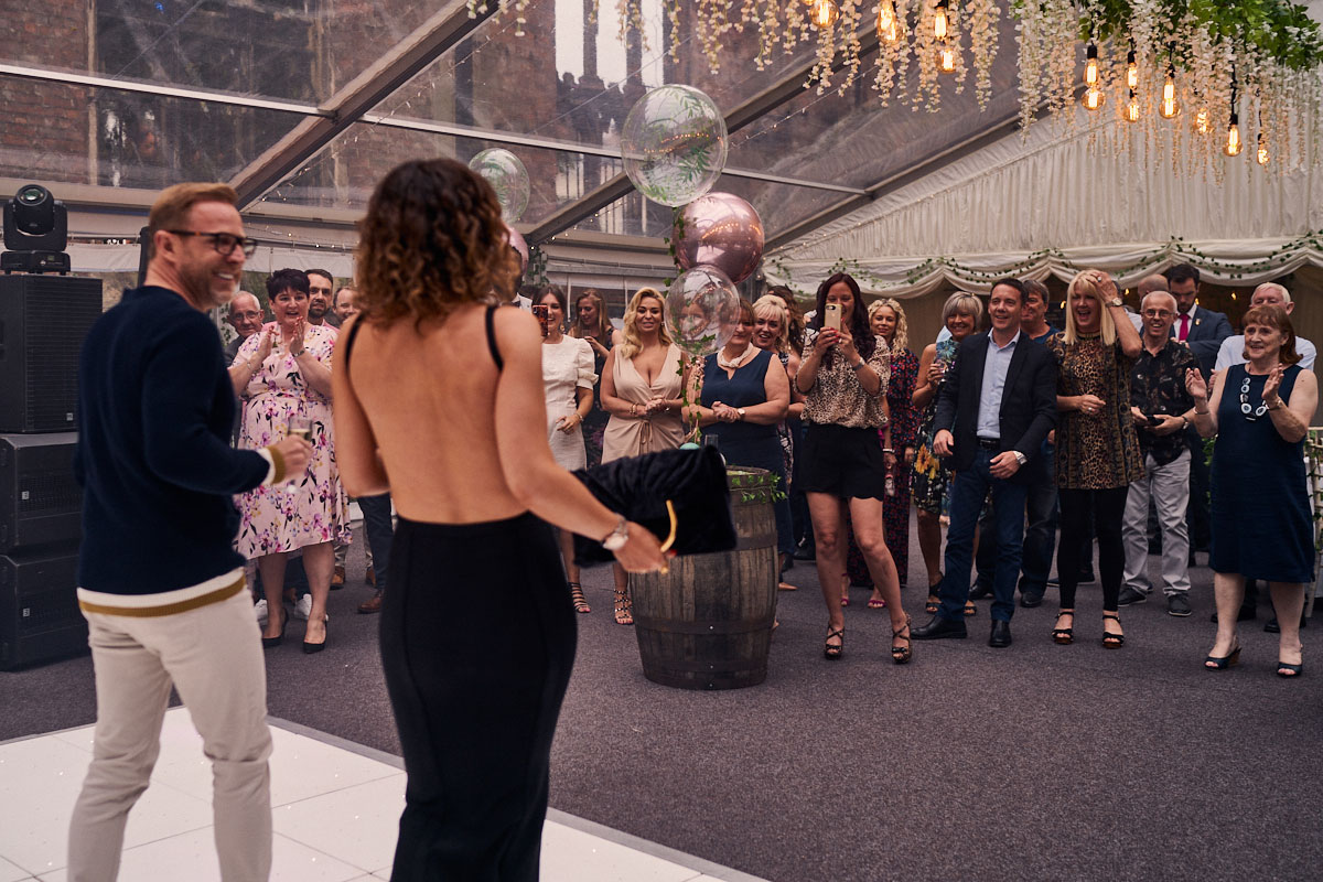 guests surprising birthday girl