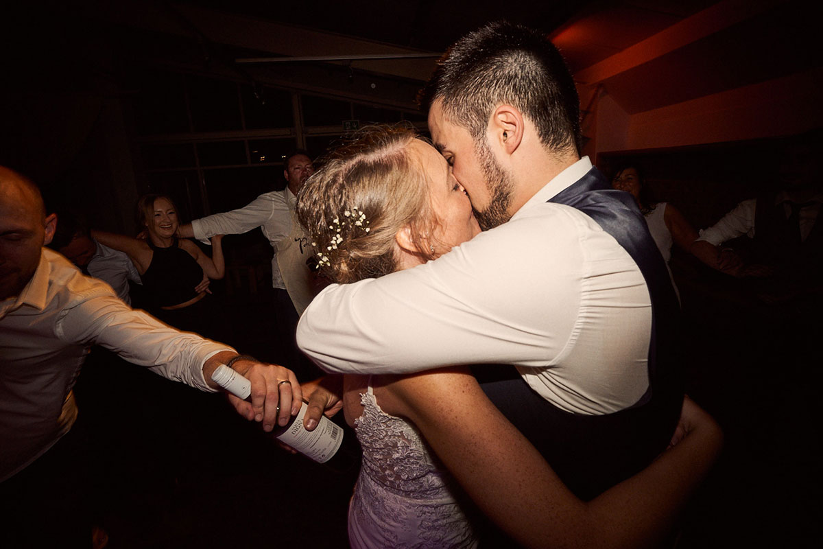 bride and groom on the dance floor at the end of the night