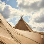 Raindrops On Tipi in Sunlight