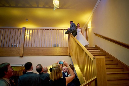 bride and groom entering reception