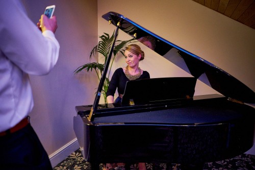 wedding guest pretending to play piano
