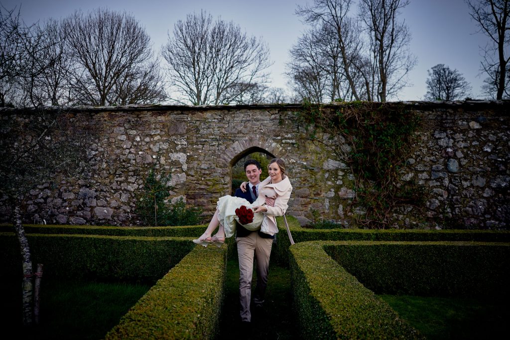 Groom Carrying bride