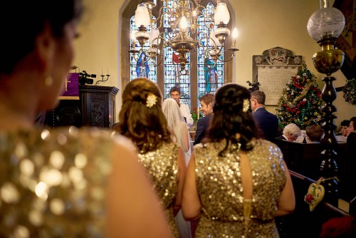 Bridesmaids Walking Down The Aisle