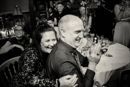 Guests Laughing At Wedding Speeches
