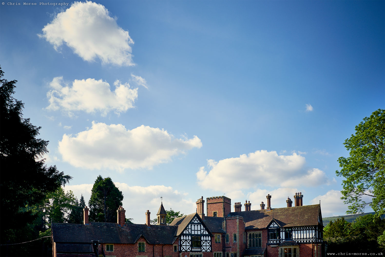 Tyn Dwr Hall and blue skies