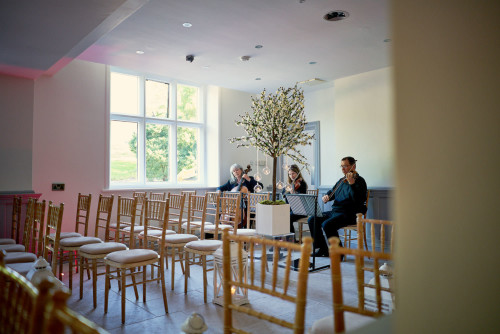 wedding musicians playing in the ceremony room at Tyn Dwr Hall