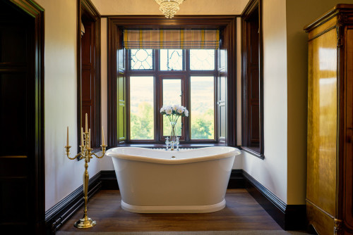 free standing bath in the window at Tyn Dwr Hall