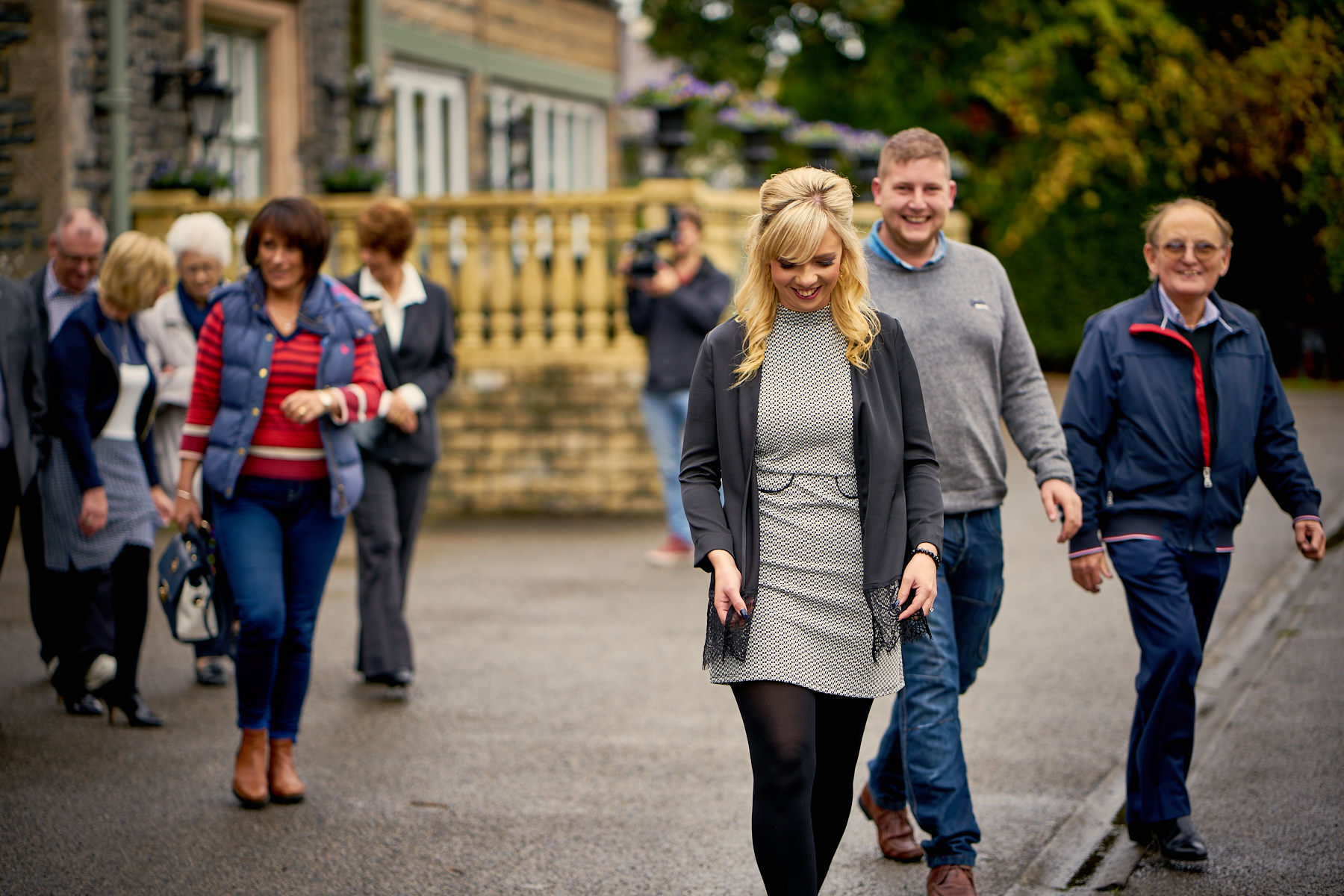People walking in Maenan Abbey carpark