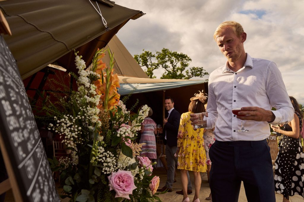 wedding guest looking at the table plan