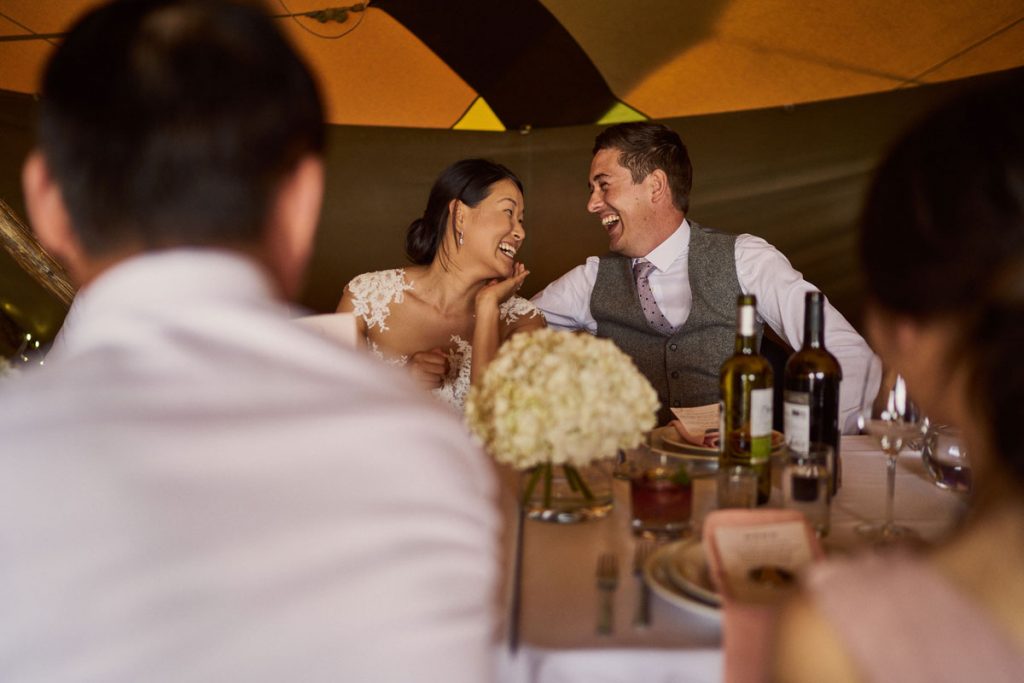 Bride & Groom laughing at each