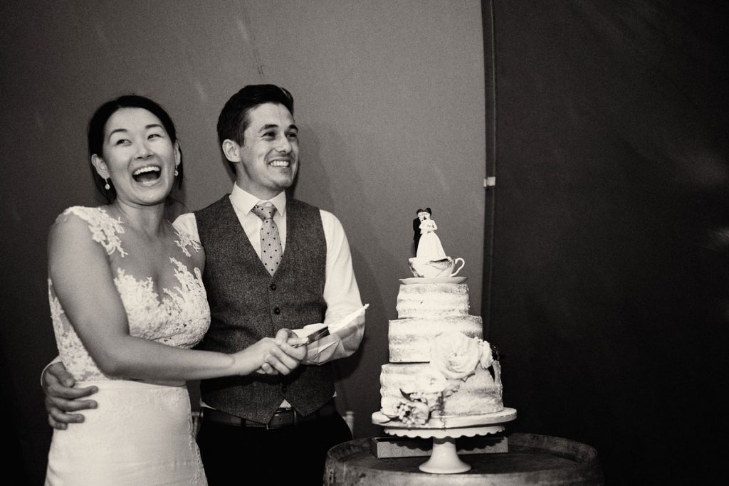 Bride & Groom cutting their wedding cake