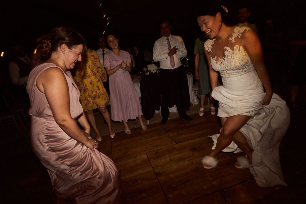 Bride dancing in her slippers